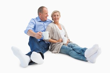 Fototapeta premium Happy mature couple having coffee