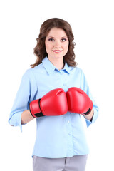 Young beautiful business woman with boxing gloves isolated