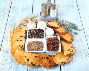 Homemade croutons on table in kitchen, close up