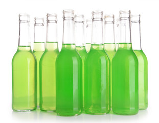 Bottles of drink on light background