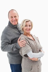 Happy mature couple in winter clothes