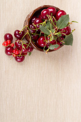 Fototapeta na wymiar Basket with ripe cherry