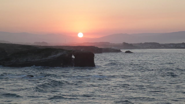 Sunset on Playa de las Catedrales, Spain