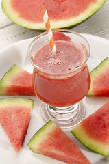 water melon smoothie with straw