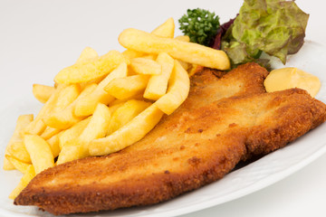 Schweinekotelett mit Pommes