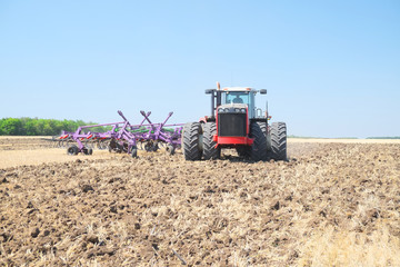 Fototapeta premium tractor with a plow
