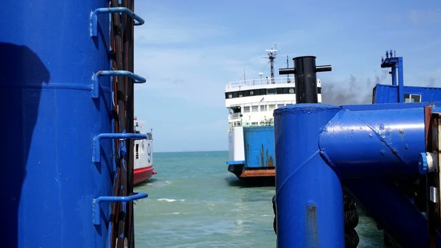 Ferry Leaves Dock in Thailand.