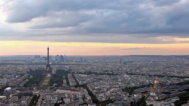 Eiffel tower ( Tour Eiffel ) in Paris at atmospheric dusk