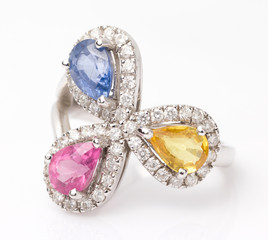 Three Color Gemstone Ring Closeup in White background