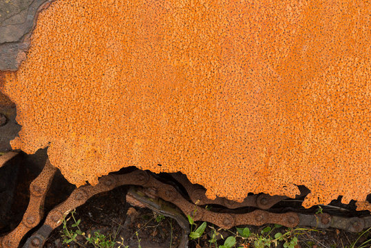 Textured rusty metal weathered and worn abstract background