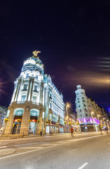 Rays of traffic lights on Gran via street