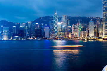 Fototapeta na wymiar Hong Kong night over Victoria Harbor with clear sky