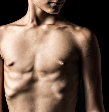Nude torso of a young man