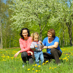 Fototapeta premium Portrait of happy grandmother, daughter and granddaughter 