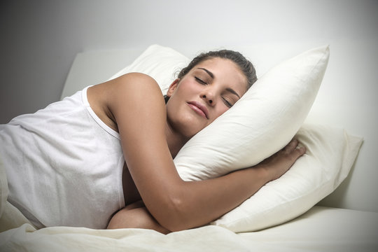 young woman being fast asleep