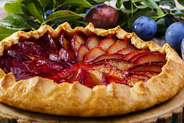 plum cake on a wooden surface