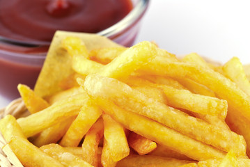 Traditional French fries with ketchup
