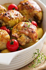 Chicken with potatoes and fresh tomatoes