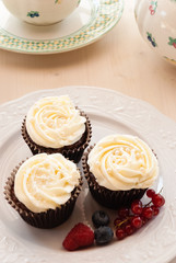 Delicious cupcake on rustic table