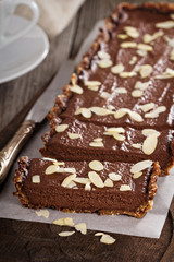Vegan chocolate tart with almonds