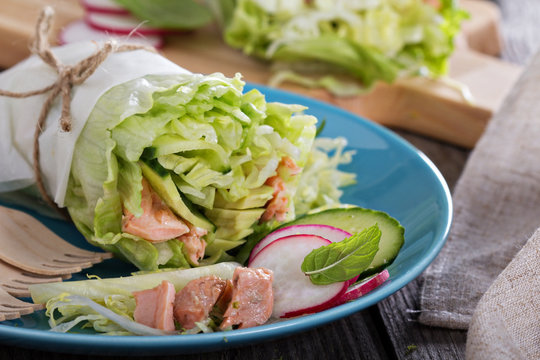 Salad with poached salmon and vegetables