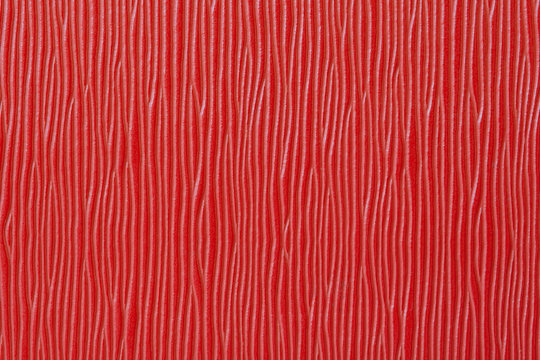 Red plastic plate background wood texture