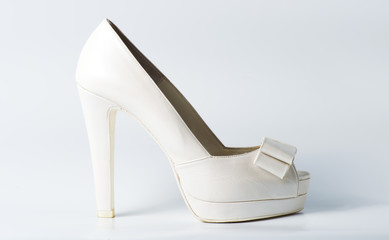 Woman white shoes on white
