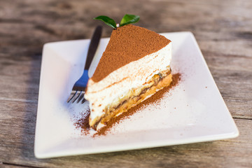 Banoffee cake on white dish.