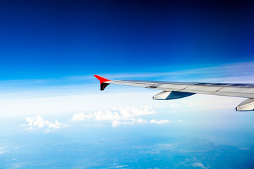 Classic image through aircraft window onto jet engine