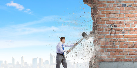 Businessman with hammer