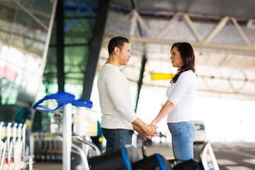 Fototapeta premium couple say good bye at airport
