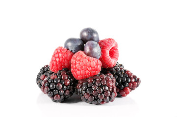 Blackberries, blueberries , raspberries on white background
