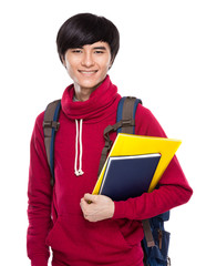 Student with school bag and handbook