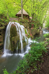 Naklejka na ściany i meble Bigar Cascade Falls in Beusnita Gorges National Park, Romania