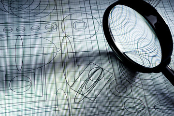 drawing and magnifying glass, selective focus