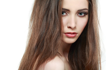 Fototapeta premium Beautiful girl on a white background, emotions, cosmetics