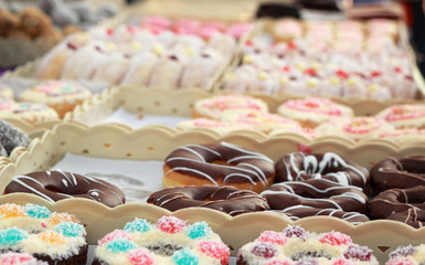 A lot of donut and strawberry jam