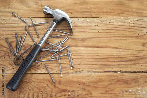 “hammer and nails on wooden background” Stock photo and royalty-free