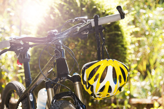 Fototapeta cycling helmet closeup on bicycle outdoors