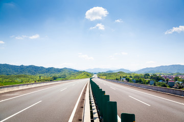 Fototapeta premium Highway, blue sky, sunny weather