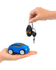 Hand with keys and car