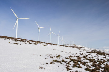 Wind turbines farm in winter, Basque Country, Spain