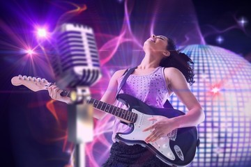Plakat Composite image of pretty girl playing guitar