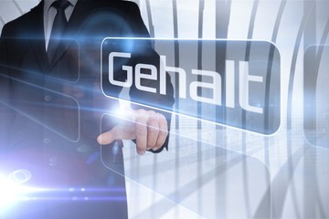 Businessman presenting the word salary in german