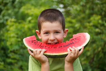 Kid eating watermelon
