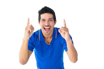 Happy football player in blue celebrating