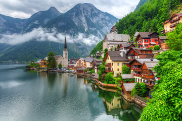 Hallstatt village in Alps at misty day, Austria - obrazy, fototapety, plakaty