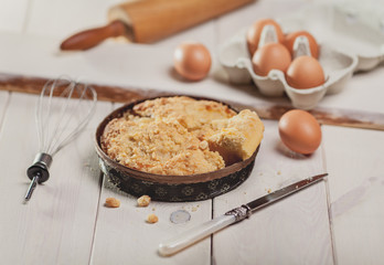 Pie apple with cinnamon on wooden desk