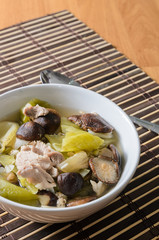 Pickled lettuce soup with shiitake mushroom and pork