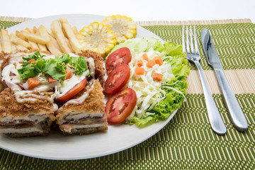 Cordon bleu with vegetables garnish